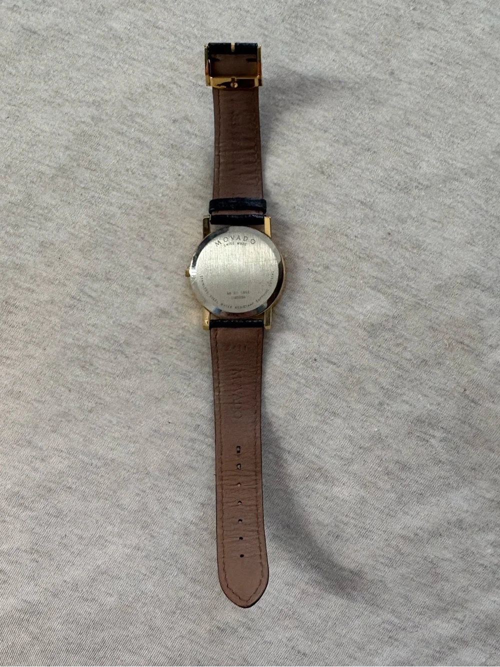 movado Gold Case Black Dial Leather Strap Watch